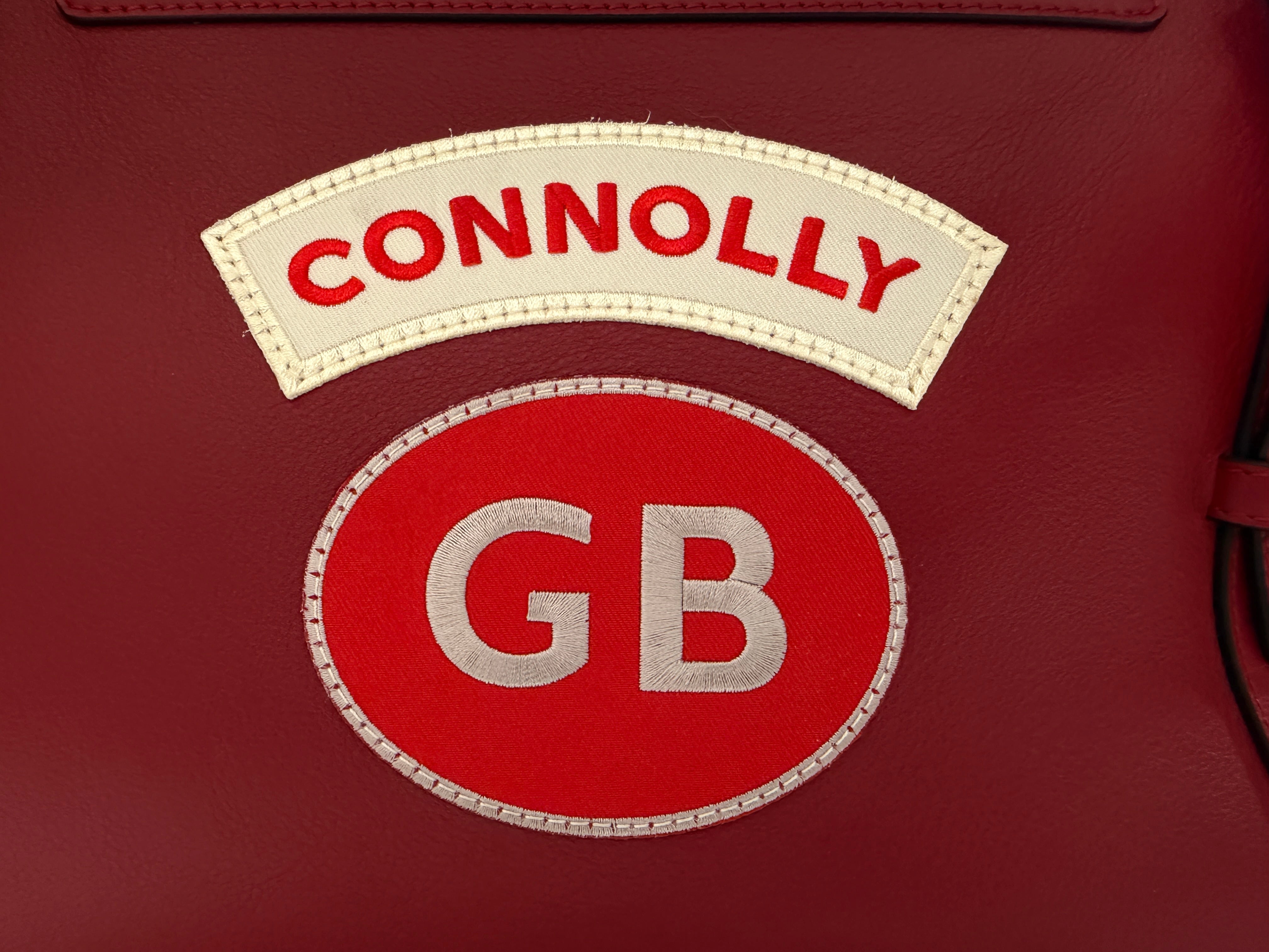 Connolly USED Red Sports Grip Bag with Badges TitchAuto